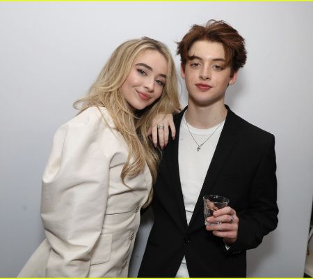 Sabrina Carpenter and her former lover Griffin Gluck pose at an after party.